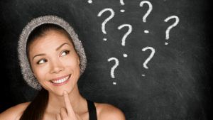 picture of woman thinking with question marks around her