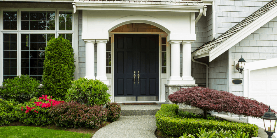 picture of the front of a house with a lock box