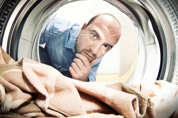 picture of a man doing laundry