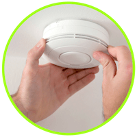 picture of a man installing a co detector
