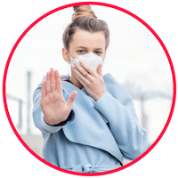 picture of a woman wearing a mask to stop pollutants