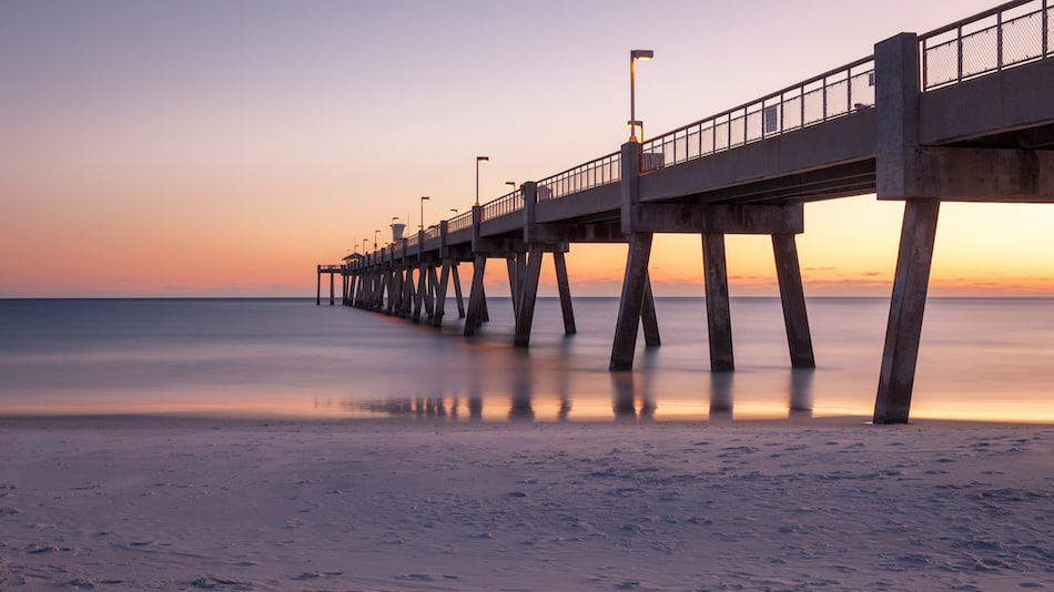 picture of Panorama of Okaloosa fishing pier in Fort Walton Beach, Florida at sunset.