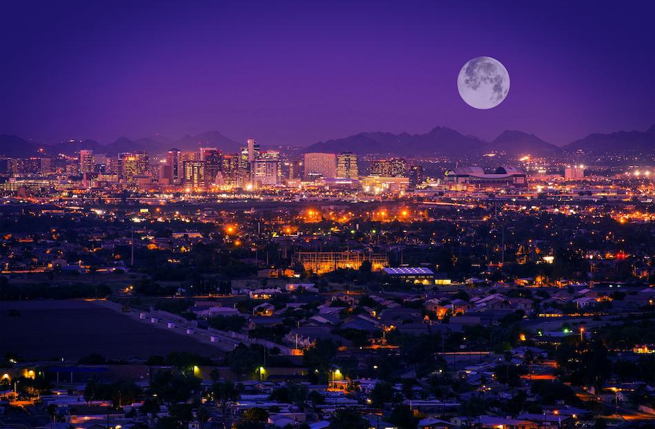 picture of Phoenix Arizona Skyline at Night. Full Moon Over Phoenix, Arizona, United States.