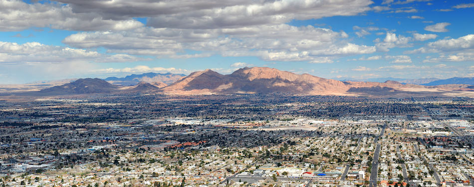 picture of Las Vegas Aerial Panorama with city skyline, mountain and streets.