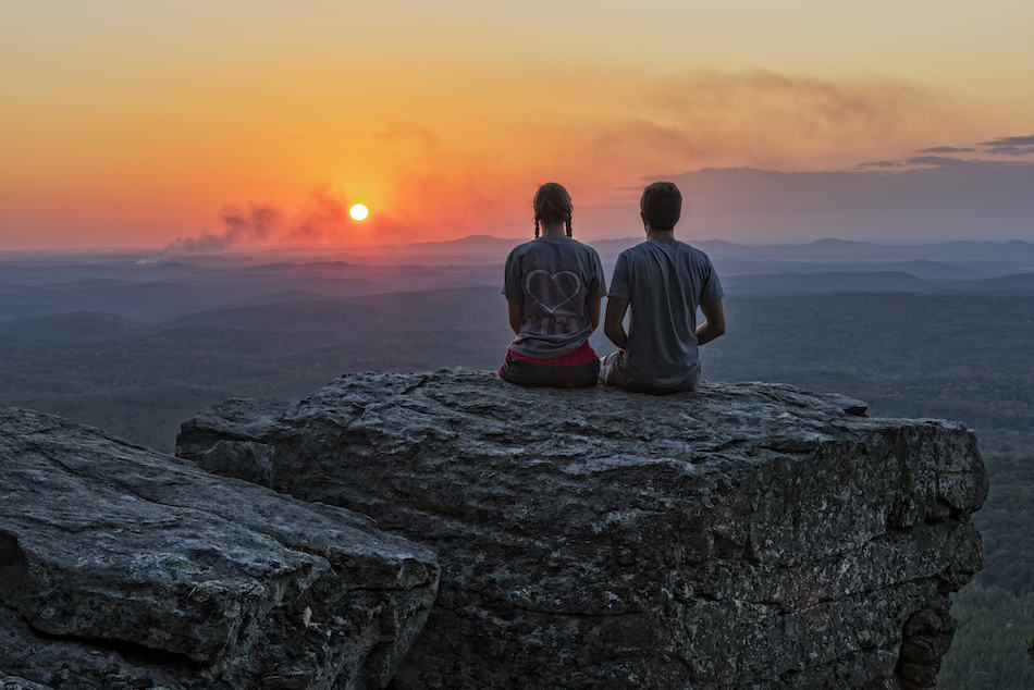 picture of Young Couple Enjoying Sunset At Cheaha Overlook In Cheaha State Park Alabama