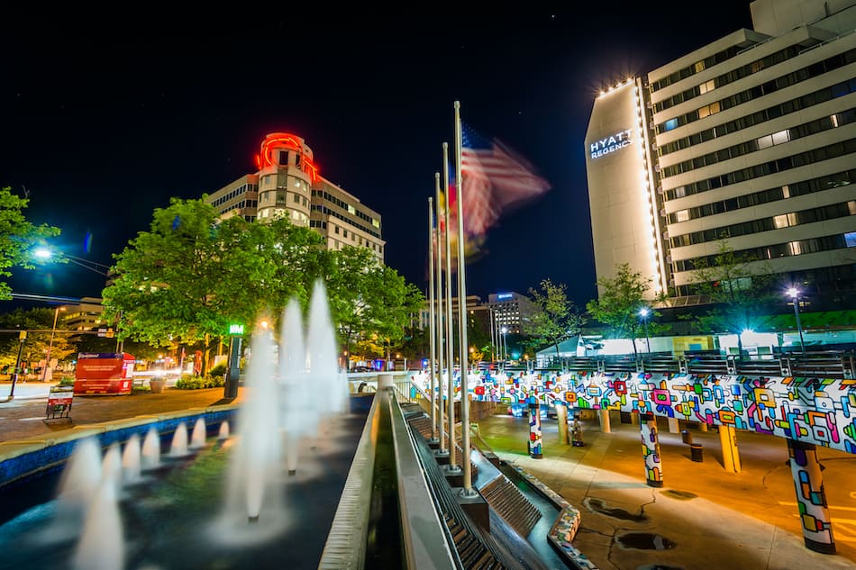 picture of Fountains and modern buildings at night, in downtown Bethesda, Maryland.
