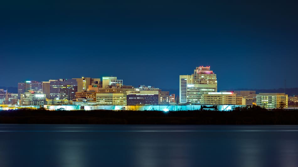 Wilmington skyline by night, viewed from New Jersey, across the Delaware River. Wilmington is the largest city in the state of Delaware.