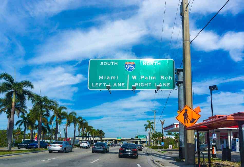 Interstate 95 sign south direction with arrow at Miami and West Palm Beach