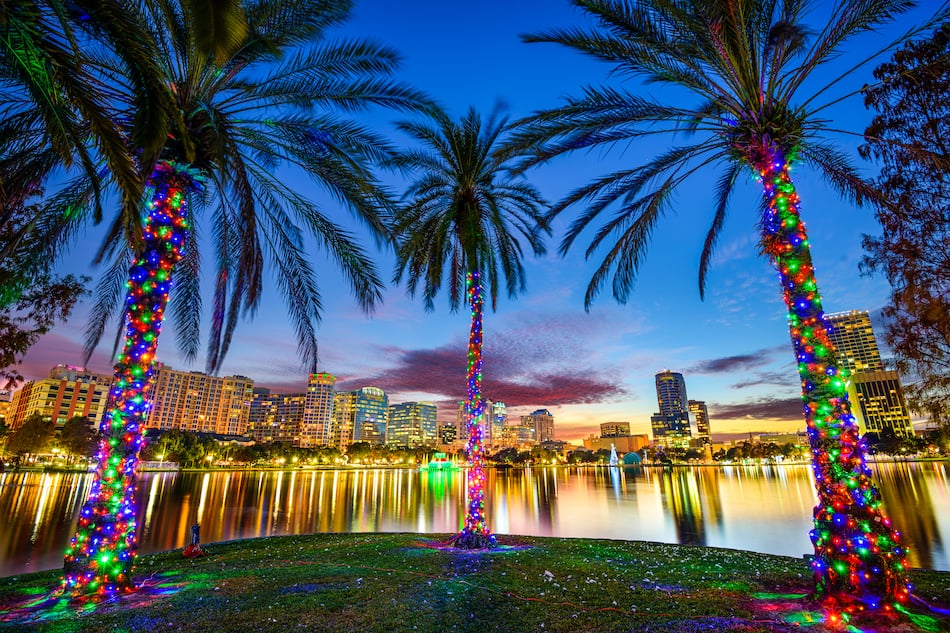 Orlando, Florida, USA downtown cityscape from Eola Lake.