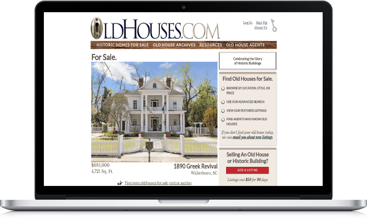 picture of old houses website on a laptop