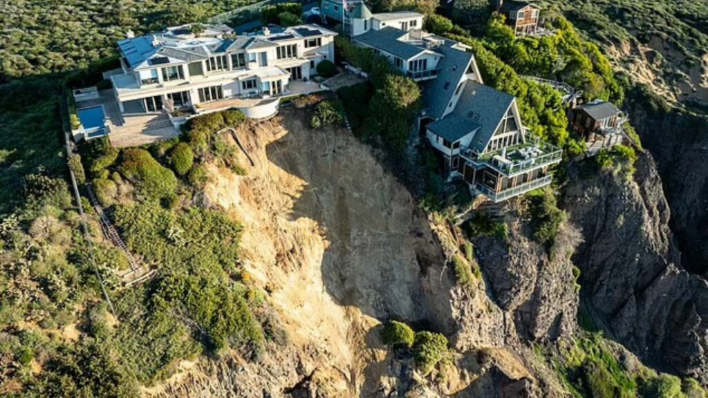Incredible Aerial Photos Show Luxury Mansions Left Hanging Off Ocean Cliffs After Landslide. Officials Say No Threat